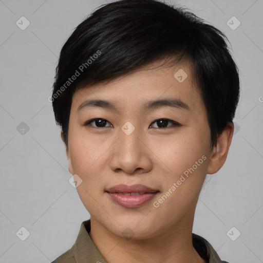 Joyful asian young-adult female with short  black hair and brown eyes