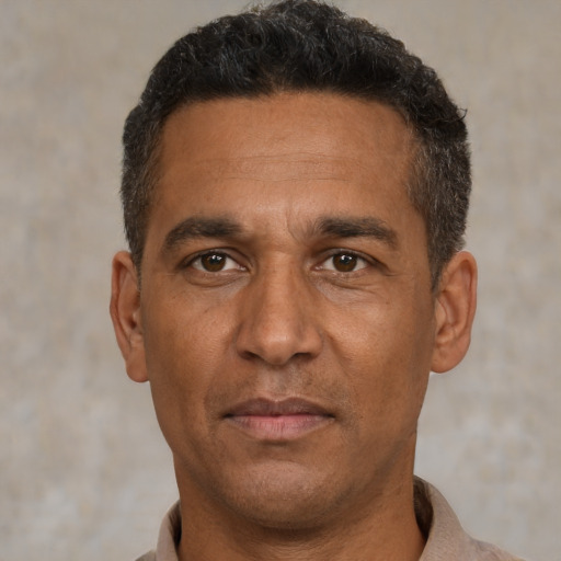 Neutral white adult male with short  black hair and brown eyes