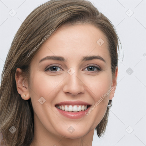 Joyful white young-adult female with long  brown hair and grey eyes