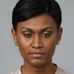 Neutral black young-adult female with short  black hair and brown eyes