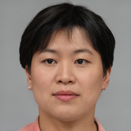 Neutral asian young-adult female with short  brown hair and brown eyes
