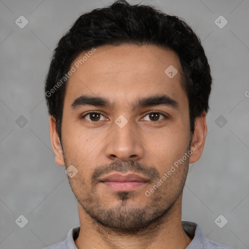 Neutral latino young-adult male with short  black hair and brown eyes