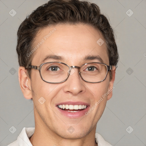 Joyful white adult male with short  brown hair and grey eyes