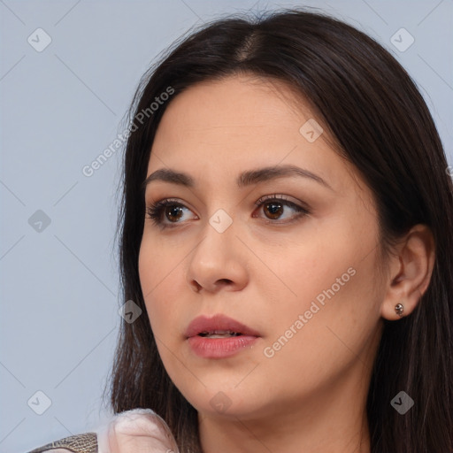 Neutral white young-adult female with long  brown hair and brown eyes