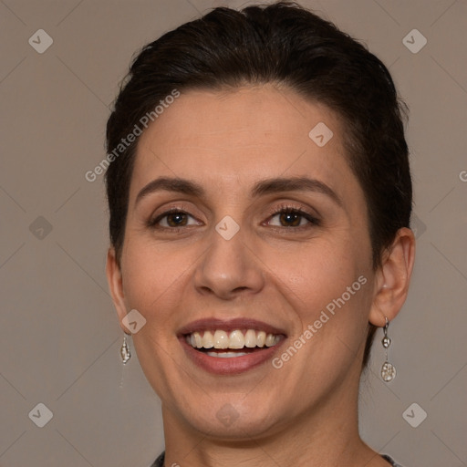 Joyful white young-adult female with short  brown hair and brown eyes