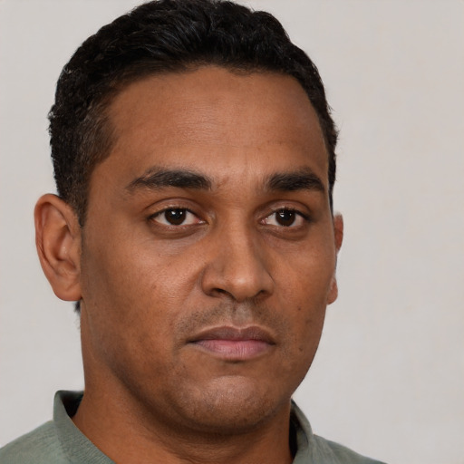 Neutral black young-adult male with short  brown hair and brown eyes