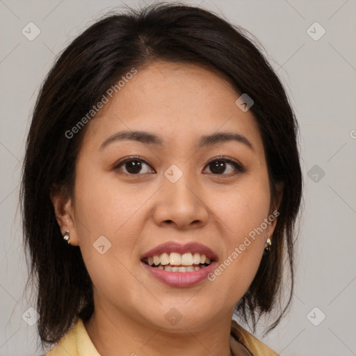 Joyful latino young-adult female with medium  brown hair and brown eyes