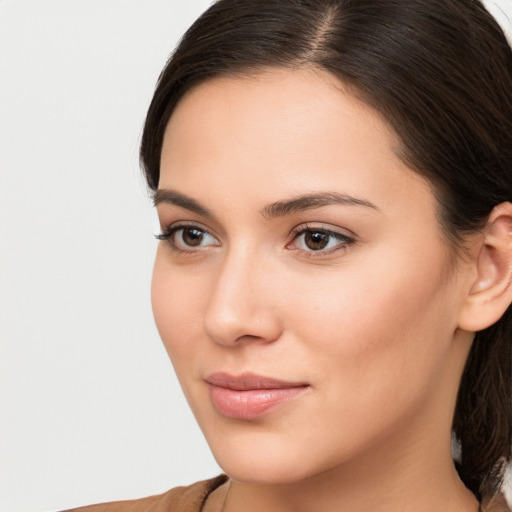 Neutral white young-adult female with medium  brown hair and brown eyes