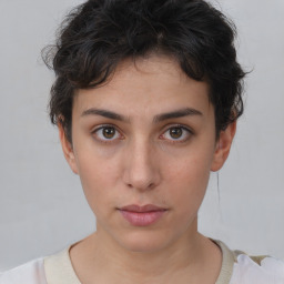 Neutral white young-adult female with short  brown hair and brown eyes