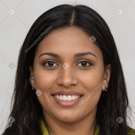 Joyful latino young-adult female with long  brown hair and brown eyes