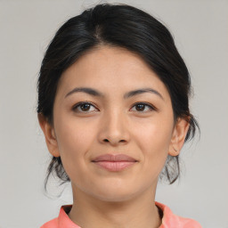 Joyful asian young-adult female with medium  brown hair and brown eyes