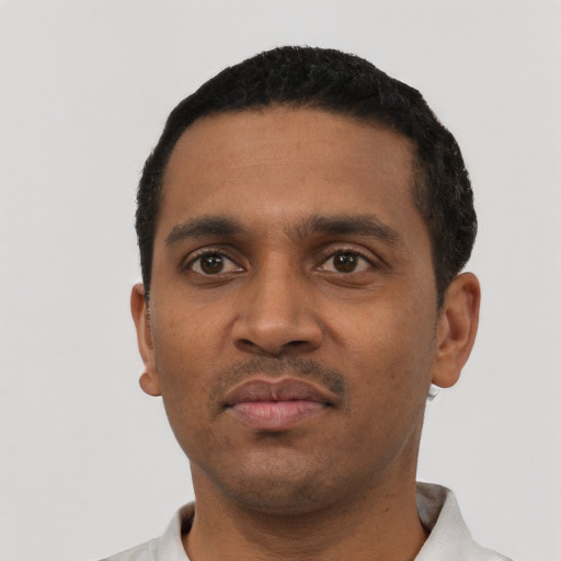 Neutral black young-adult male with short  black hair and brown eyes