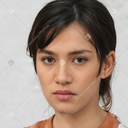 Neutral white young-adult female with medium  brown hair and brown eyes