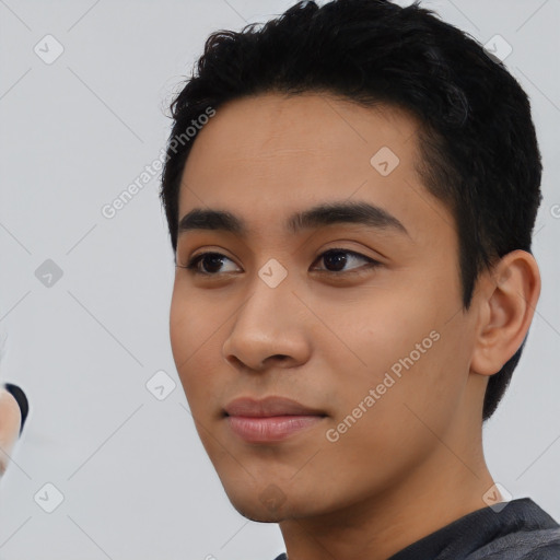 Neutral asian young-adult male with short  black hair and brown eyes