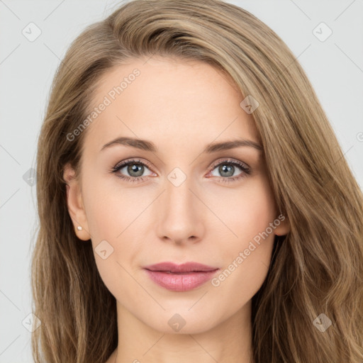 Joyful white young-adult female with long  brown hair and green eyes