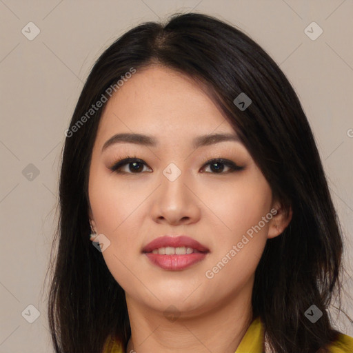 Joyful asian young-adult female with long  brown hair and brown eyes