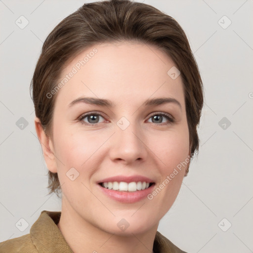 Joyful white young-adult female with medium  brown hair and grey eyes