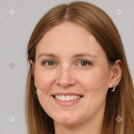 Joyful white adult female with long  brown hair and brown eyes