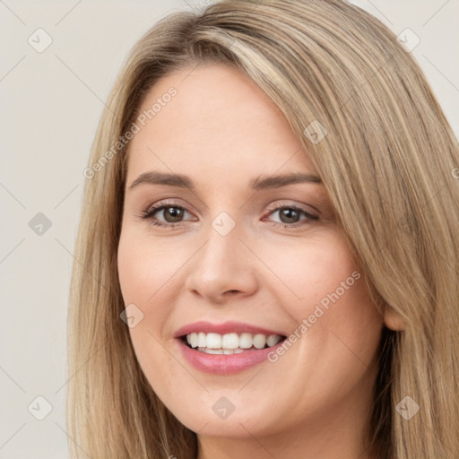 Joyful white young-adult female with long  brown hair and brown eyes