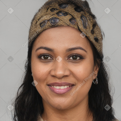 Joyful black young-adult female with long  brown hair and brown eyes