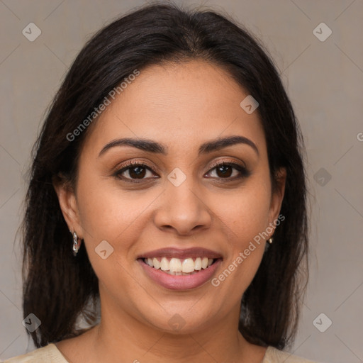 Joyful latino young-adult female with medium  brown hair and brown eyes