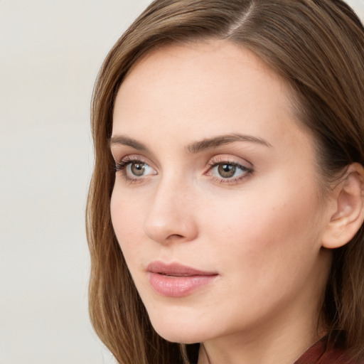 Neutral white young-adult female with long  brown hair and grey eyes