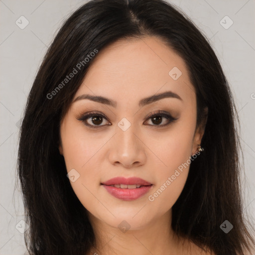 Joyful asian young-adult female with long  brown hair and brown eyes