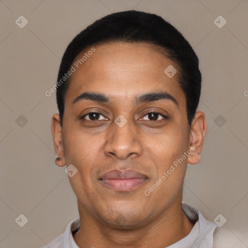 Joyful latino young-adult male with short  black hair and brown eyes