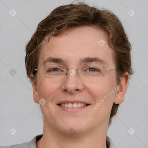 Joyful white adult male with short  brown hair and grey eyes