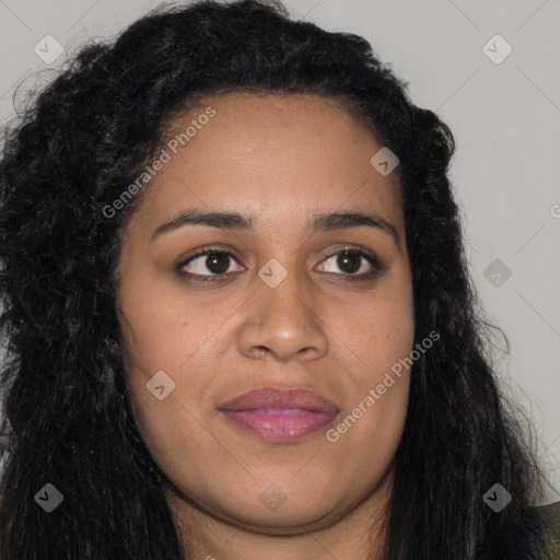 Joyful black young-adult female with long  brown hair and brown eyes