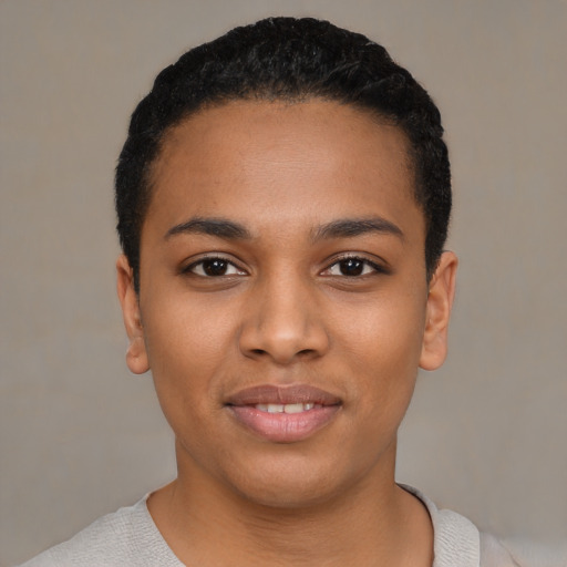 Joyful latino young-adult female with short  black hair and brown eyes