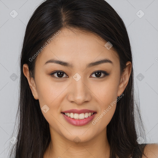 Joyful asian young-adult female with long  brown hair and brown eyes