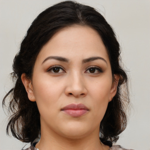 Neutral latino young-adult female with medium  brown hair and brown eyes