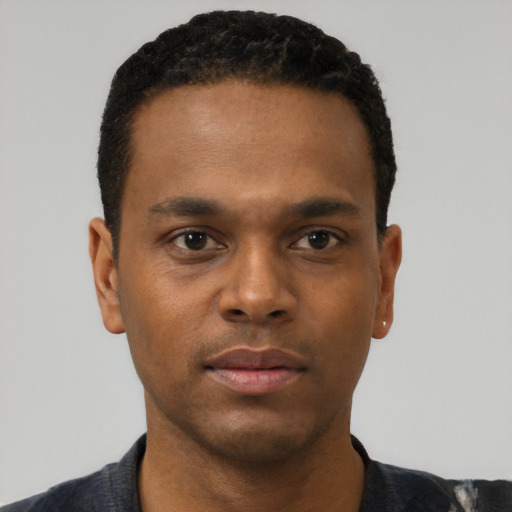 Neutral black young-adult male with short  black hair and brown eyes