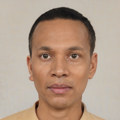 Neutral black young-adult male with short  black hair and brown eyes