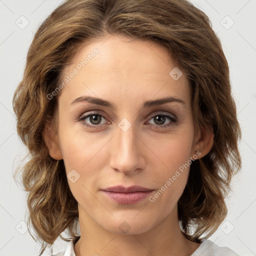 Joyful white young-adult female with medium  brown hair and green eyes