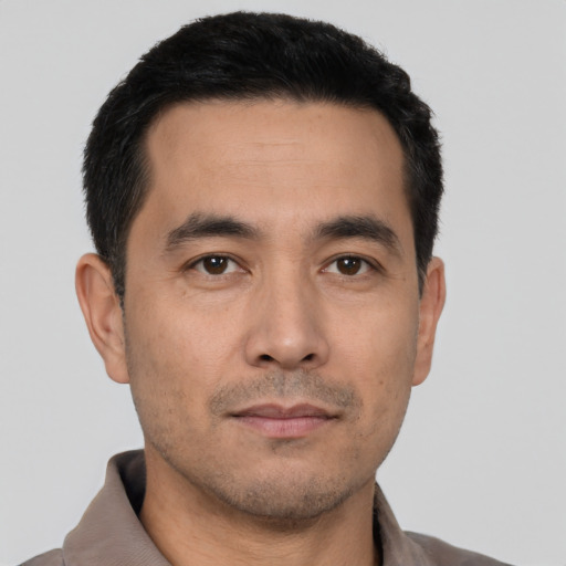 Neutral asian young-adult male with short  black hair and brown eyes