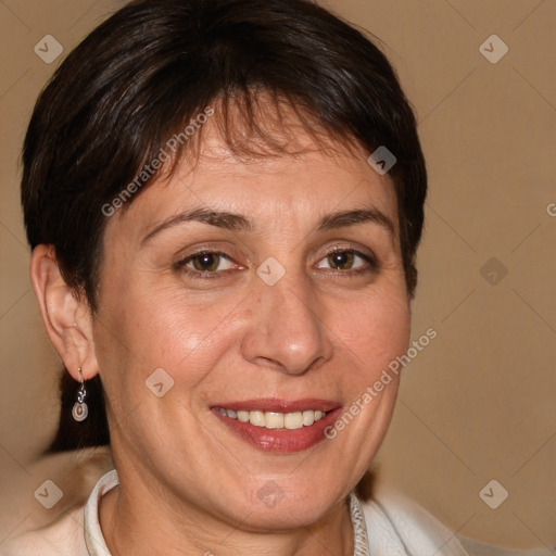 Joyful white adult female with medium  brown hair and brown eyes