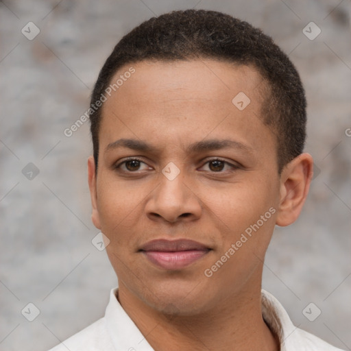 Joyful latino young-adult male with short  brown hair and brown eyes