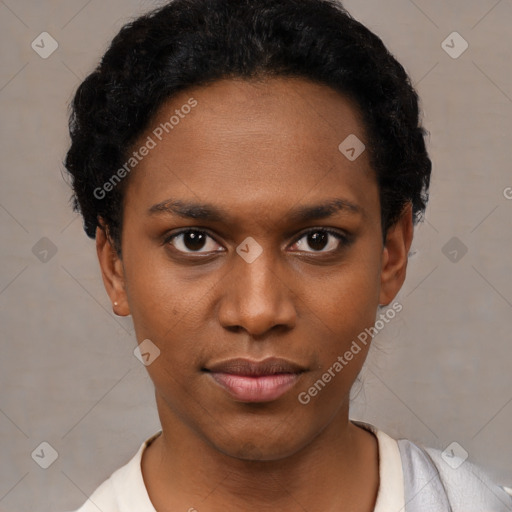 Joyful black young-adult female with short  black hair and brown eyes