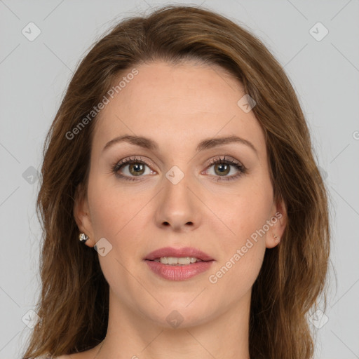 Joyful white young-adult female with long  brown hair and green eyes