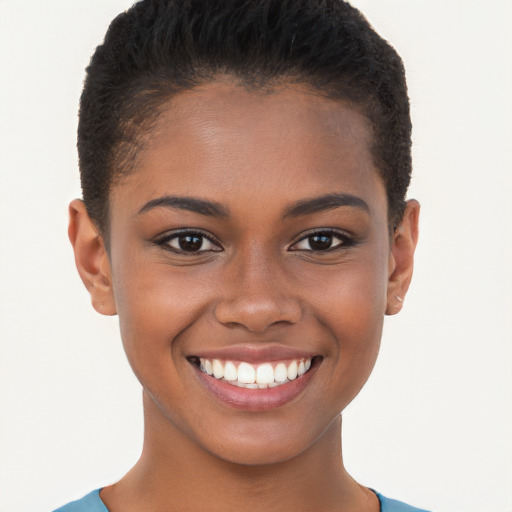 Joyful black young-adult female with short  brown hair and brown eyes