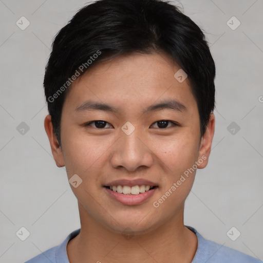Joyful asian young-adult male with short  black hair and brown eyes