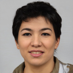 Joyful asian young-adult female with short  black hair and brown eyes