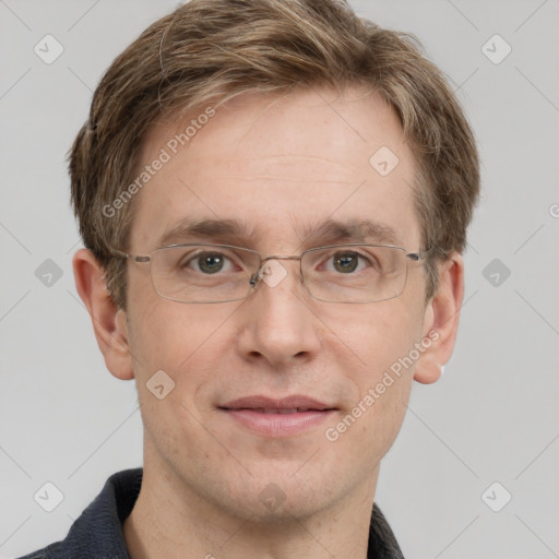 Joyful white adult male with short  brown hair and grey eyes