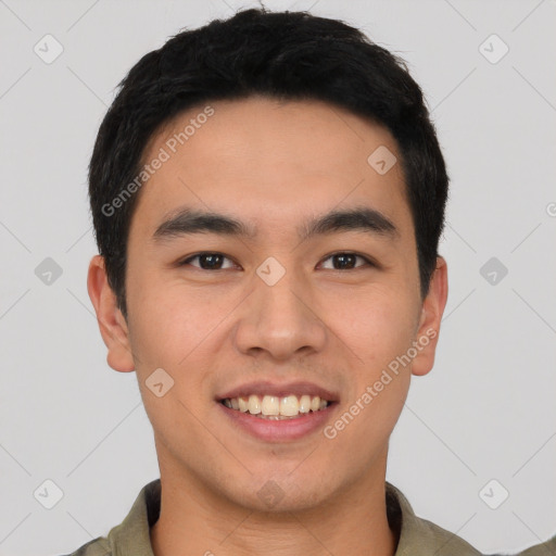 Joyful white young-adult male with short  black hair and brown eyes