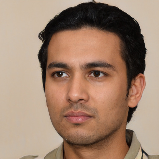 Neutral latino young-adult male with short  black hair and brown eyes