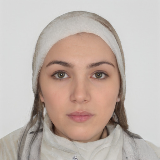 Neutral white young-adult female with medium  brown hair and brown eyes