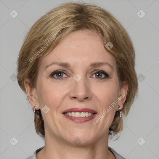 Joyful white adult female with medium  brown hair and grey eyes