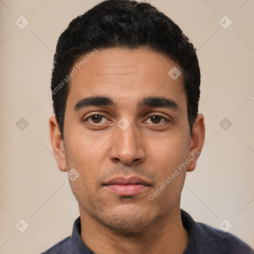 Neutral latino young-adult male with short  black hair and brown eyes